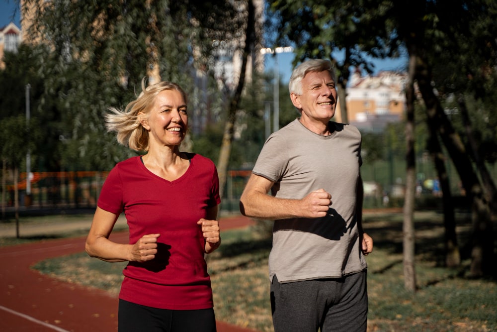 Couple jogging together outdoors